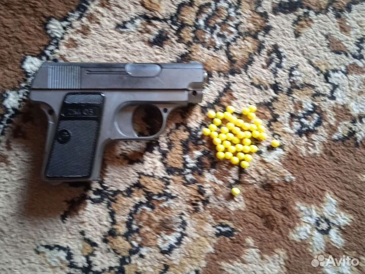 Игрушечный пистолет