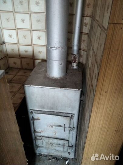 Котел на твердом топливе (система отопления )