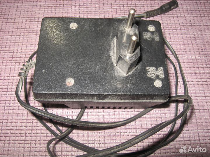 Блок питания eleka universal AC-DC adaptor 1,5-12V