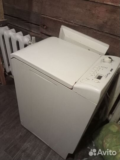 Стиральная машина с вертикальной загрузкой