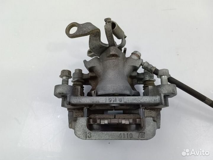 Суппорт тормозной задний левый Outlander 2012-2021