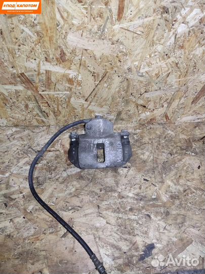 Суппорт тормозной задний левый Toyota Camry XV40