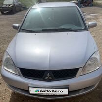 Mitsubishi Lancer 1.6 MT, 2006, 200 000 км, с пробегом, цена 380 000 руб.