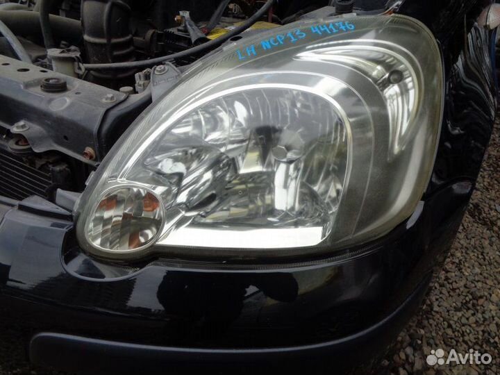 Фара левая Toyota Vitz NCP13 1NZ-FE 2004/10