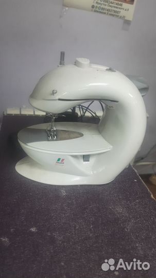 Швейная машина deloni