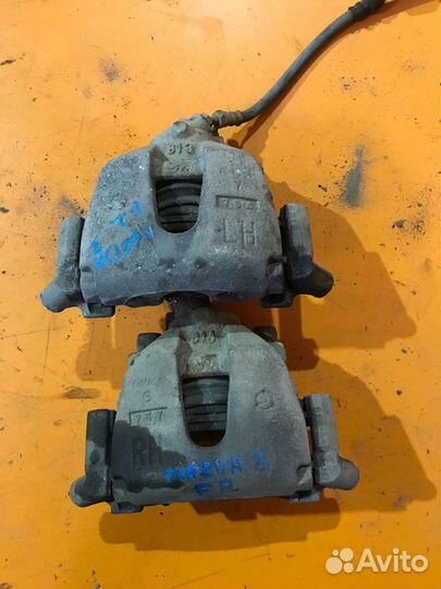 Суппорт тормозной передний на Mazda 3 BK