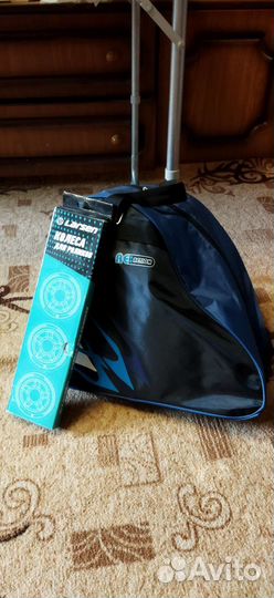 Роликовые коньки