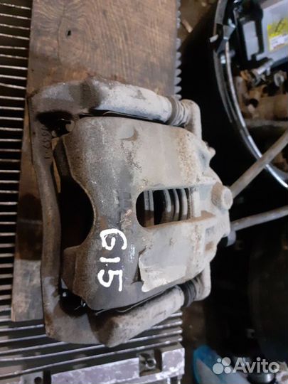 Суппорт тормозной Nissan Almera (G15)