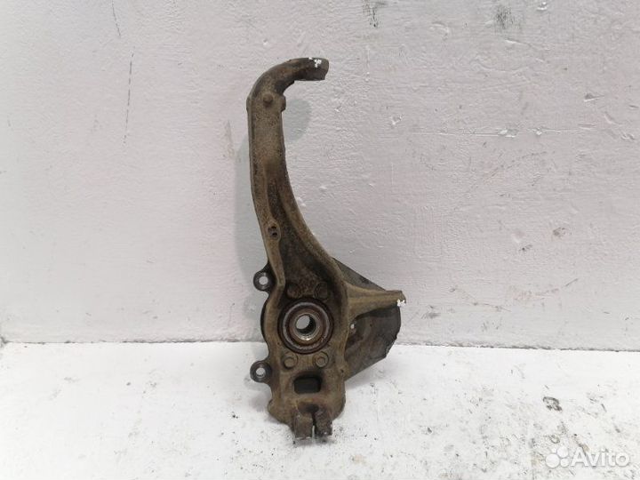 Кулак поворотный передний левый Nissan Navara 2.5