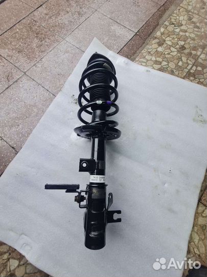 Стойка амортизатора Mazda сх 9 (2) 2018-2022г