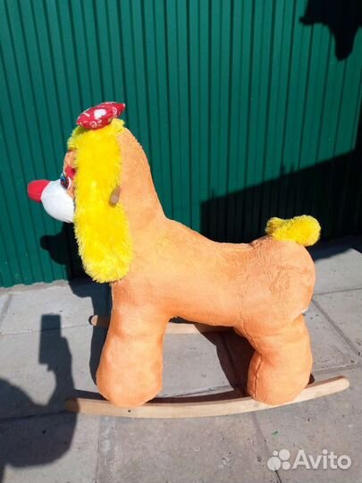 Собака качалка