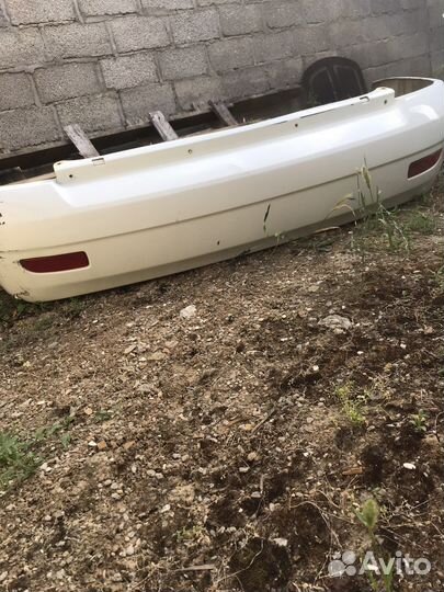 Задний бампер на priora