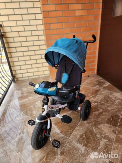 Детский трехколесный велосипед с ручкой