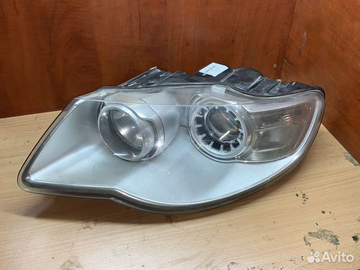 Фара левая Volkswagen Touareg рестайлинг 2009 г
