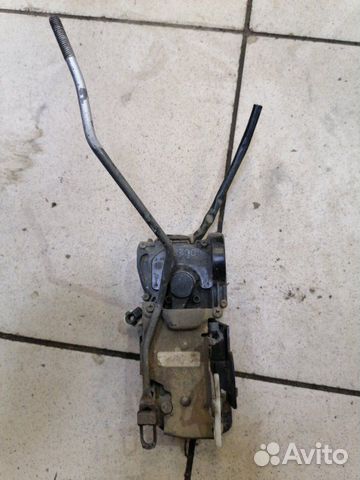 Замок дверной передний левый Mazda Familia