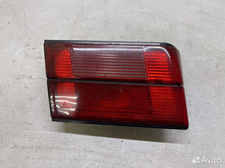 Фонарь левый в крышку багажника для BMW E34