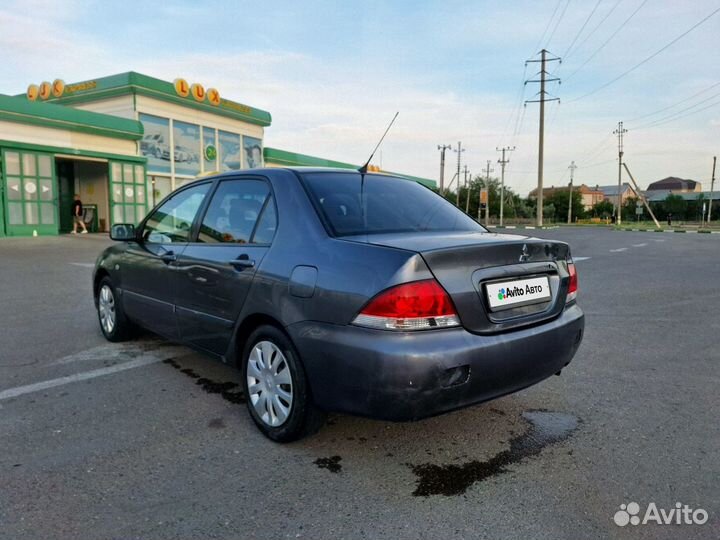 Mitsubishi Lancer 1.6 МТ, 2005, 230 000 км