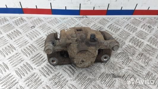 Суппорт тормозной задний левый KIA sorento 2 (XKR0