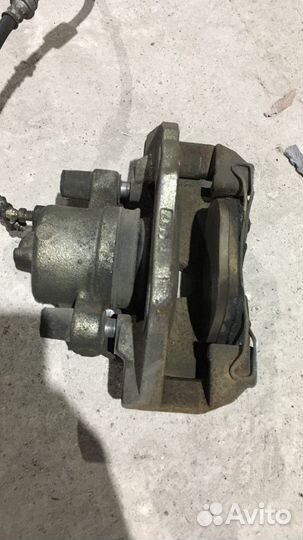 Суппорт тормозной передний правый Mazda 3 BK