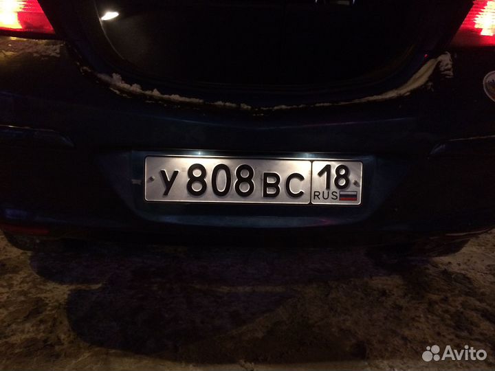 Подсветка номера Opel Astra H J Corsa
