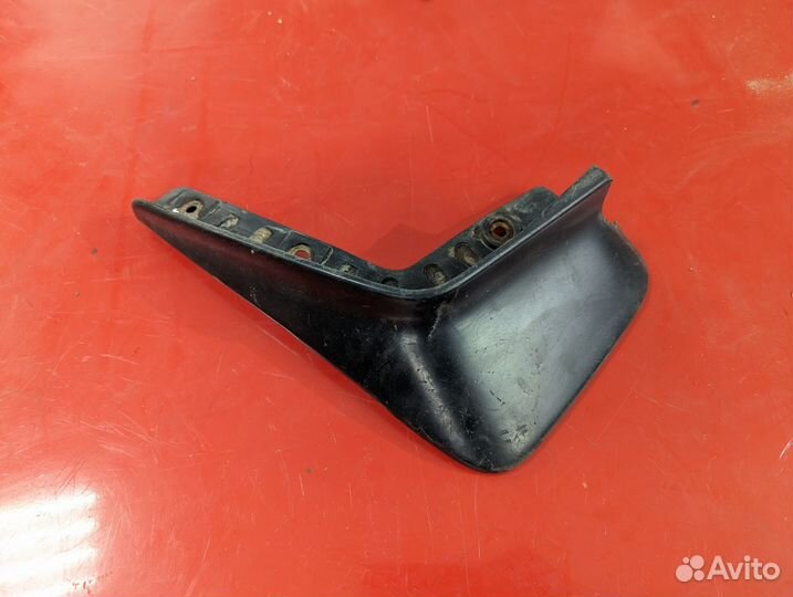 Брызговик передний левый Mitsubishi Lancer 9