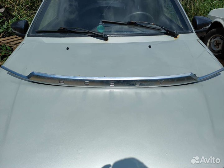 Накладка на заднюю крышку багажника Geely coolray