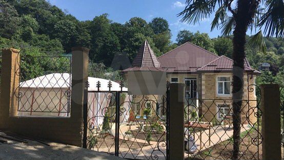 Коттедж 560 м² на участке 12,5 сот.