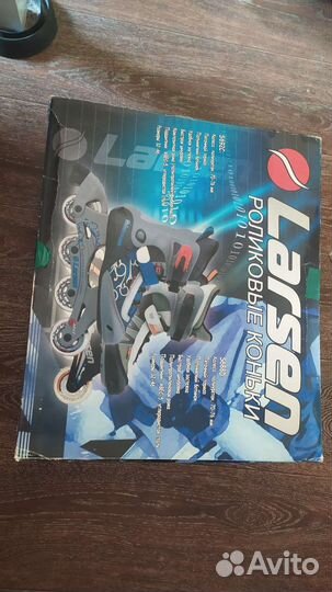 Роликовые коньки