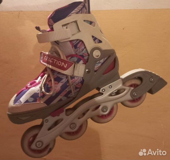 Роликовые коньки