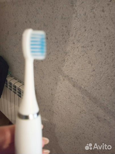 Электронная зубная щетка