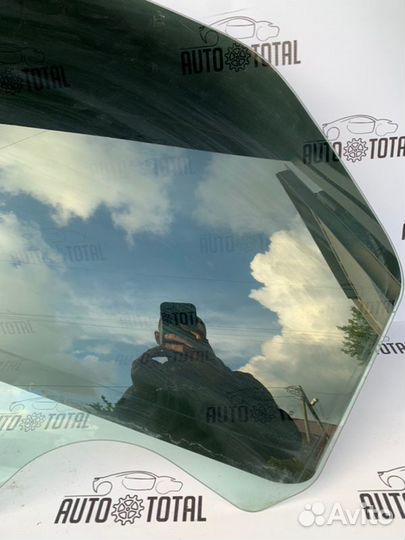 Стекло двери заднее левое Renault Logan K7J710