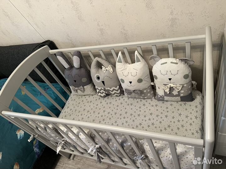 Бортики подушки в кроватку