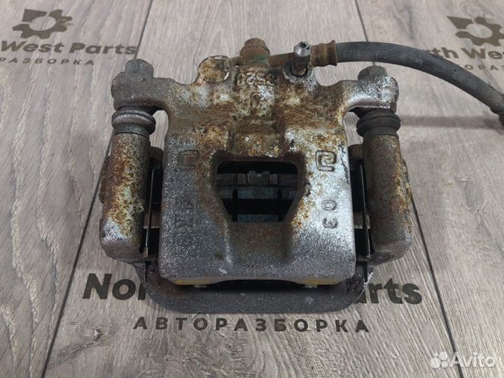 Суппорт задний правый Nissan Juke (Yf15)