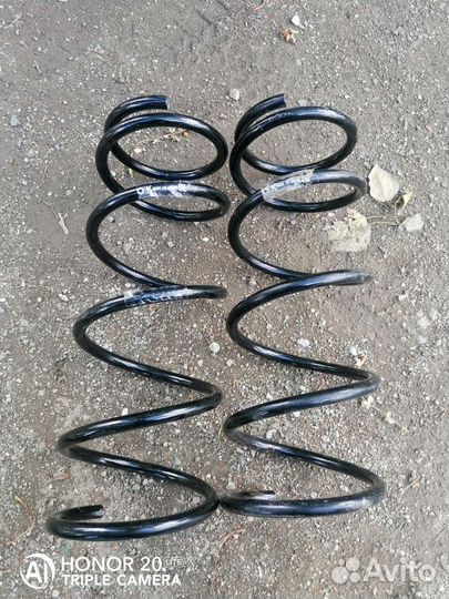 Nissan note передняя пружина