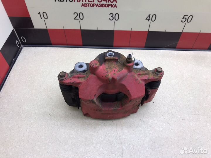 Суппорт тормозной передний левый Шевроле Круз