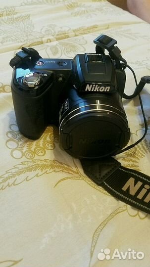 Цифровой фотоаппарат Nikon Coolpix L110 на батарей