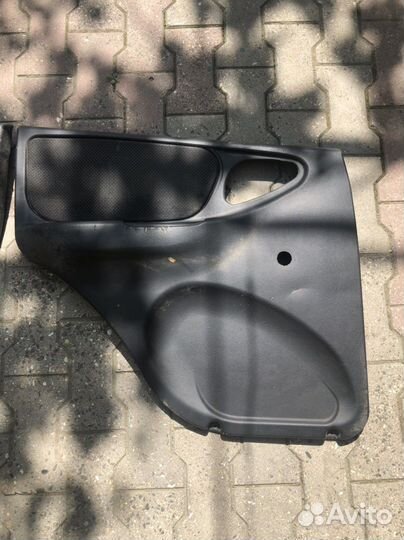 Обшивки шевроле нива задние