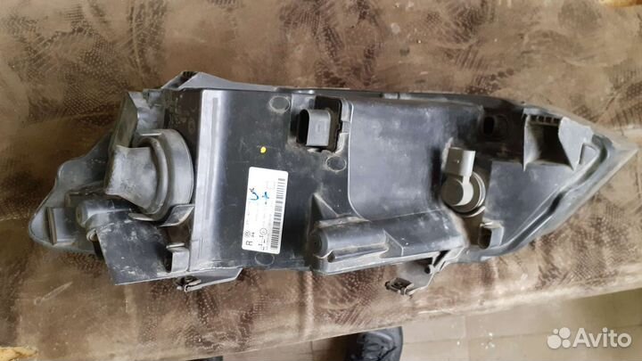 Фара передняя првая VW polo