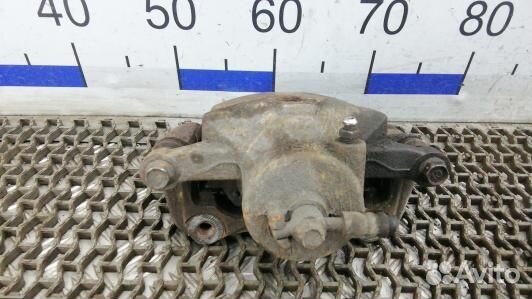 Суппорт тормозной передний правый KIA CEE'D 2 (JD)