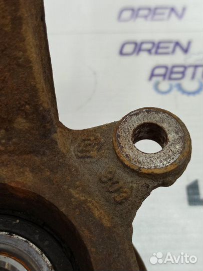 Кулак поворотный передний левый Nissan Note E11