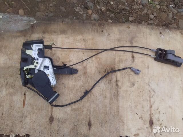 Замок двери передней Toyota Land Cruiser 100