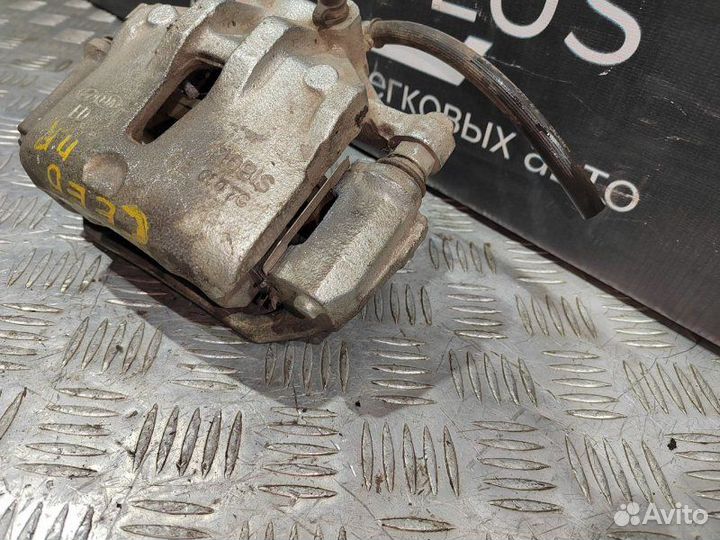 Суппорт тормозной передний правый Kia Ceed ED