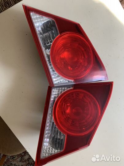 Фонари на крышку багажника