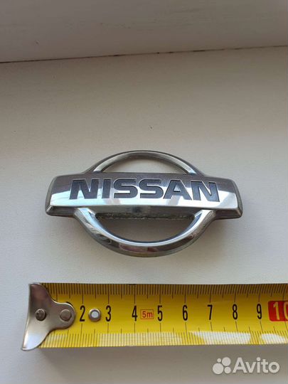 Эмблема nissan новая
