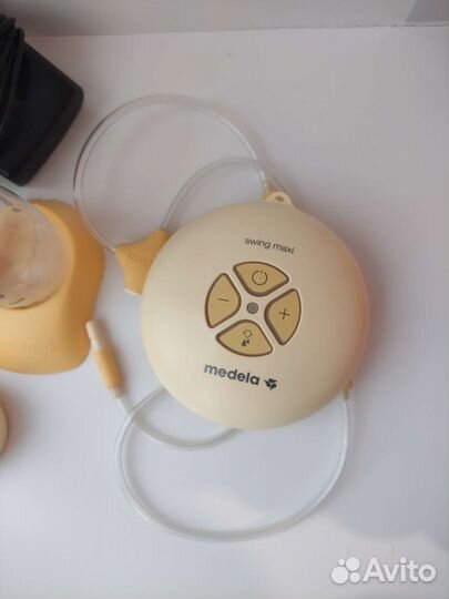 Молокоотсос Medela Swing Maxi & Calma двойной