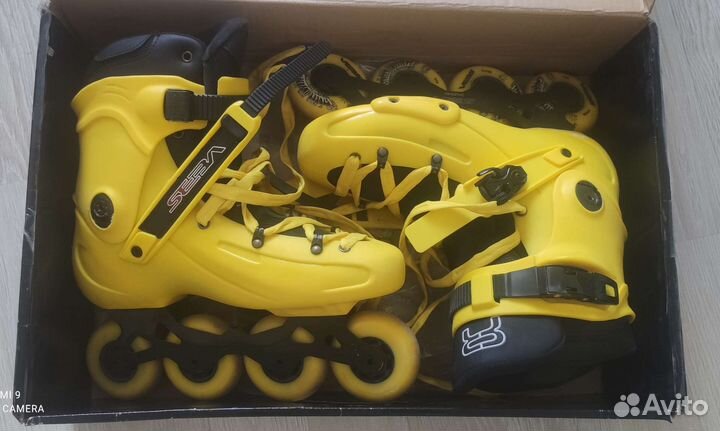 Роликовые коньки