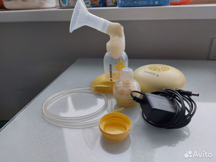 Молокоотсос medela swing электронный