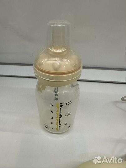 Молокоотсос medela электрический