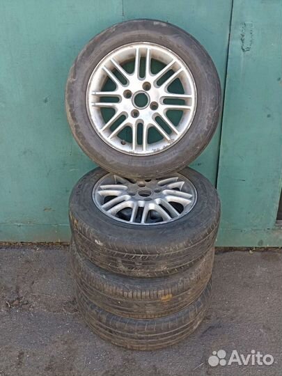 Комплект литых дисков Ford R15 с летней резиной