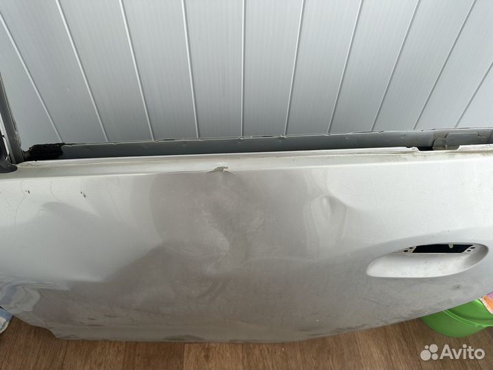 Дверь Reno Logan 2